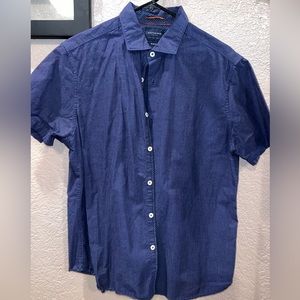 Blue button down shirt-sleeved shirt